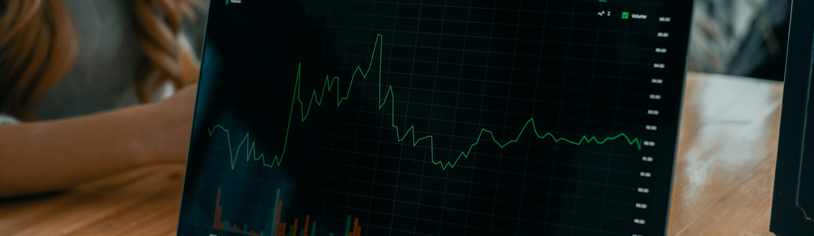 computer with stock report on screen