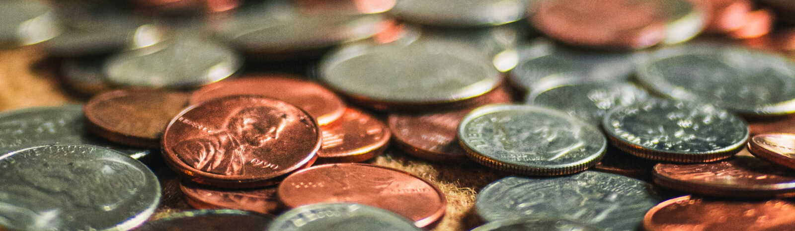 coins scattered across a desk